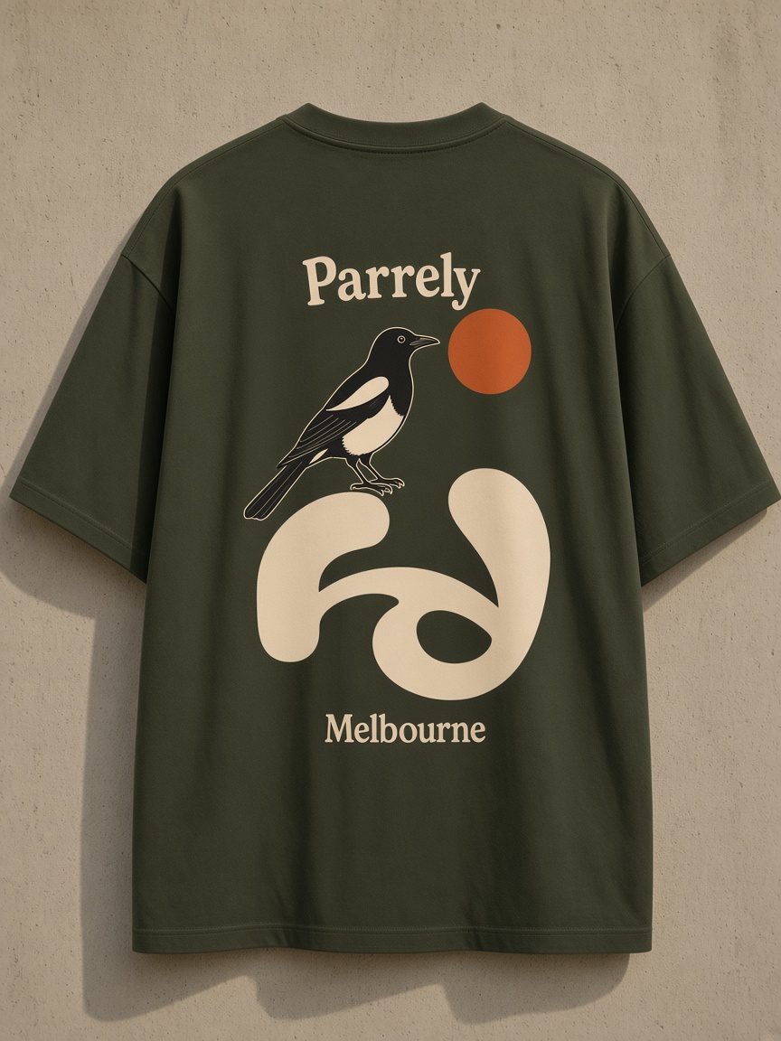 Dark olive Heavyweight Tee with a magpie and Parrely mark printed across the back